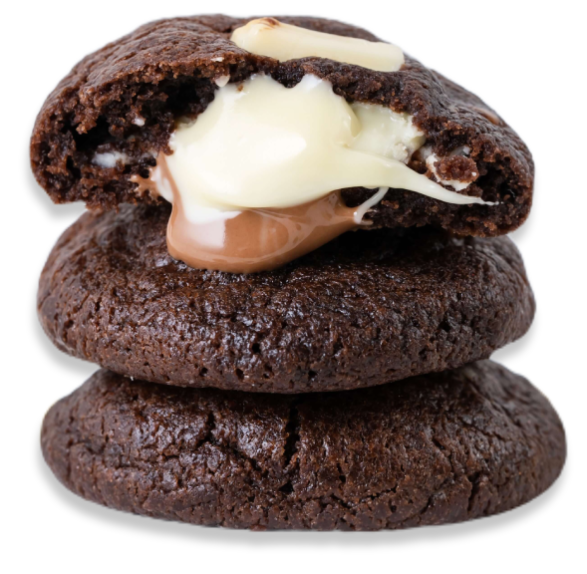 A stack of chocolate cookies with white frosting.